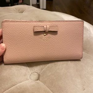 Lightly used light pink pebbled kate spade wallet.